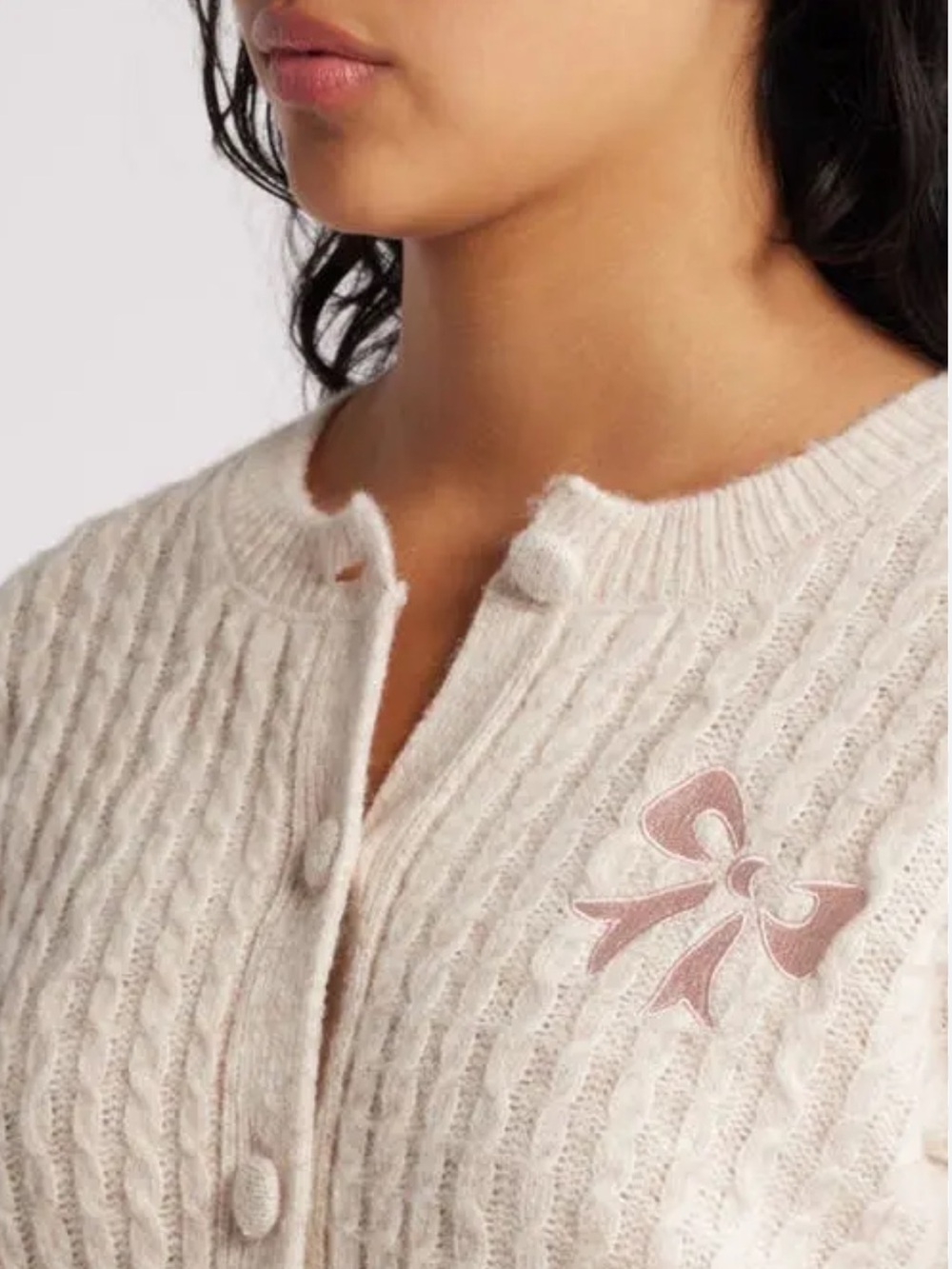 Thread & Supply Cream Cable-Knit Cardigan with Pink Bow Embroidery